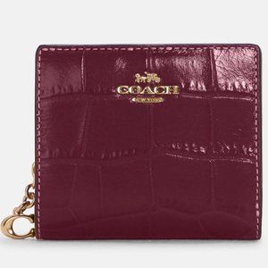 COACH Snap Wallet COLOR: Gold/Dark Berry
